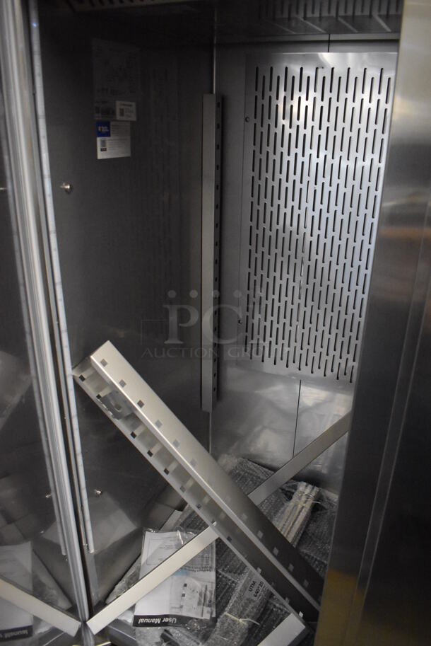 BRAND NEW SCRATCH AND DENT! Avantco 178Z2FHC Stainless Steel Commercial 2 Door Reach In Freezer on Commercial Casters. 115 Volts, 1 Phase. 54x32x82. Tested and Working! - Image 3 of 6