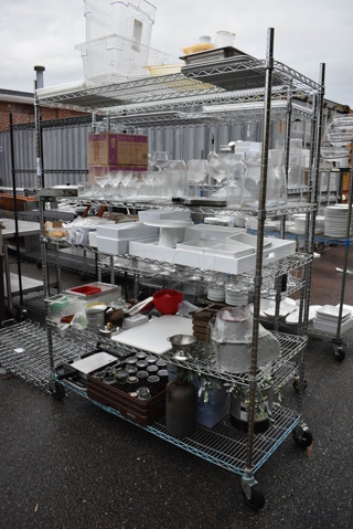 ALL ONE MONEY! Lot of 5 Tiers of Various Smallwares Including White Ceramic Dishes, Glassware, Poly Bins and Food Processor Piece. Does Not Include Shelving Unit