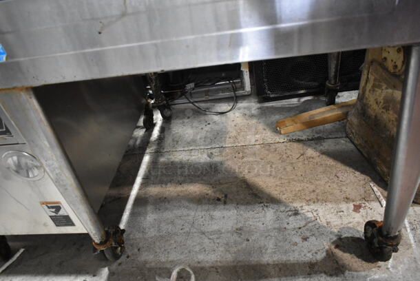 Blodgett BDO-100-G-ES Stainless Steel Commercial Natural Gas Powered Full Size Convection Oven w/ View Through Doors, Metal Oven Racks, Thermostatic Controls and Metal Legs on Commercial Casters.  - Image 5 of 6