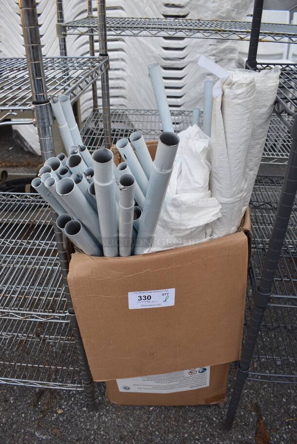 ALL ONE MONEY! Lot of White Metal Poles and Fire Extinguisher. Buyer Must Pick Up - We Will Not Ship This Item