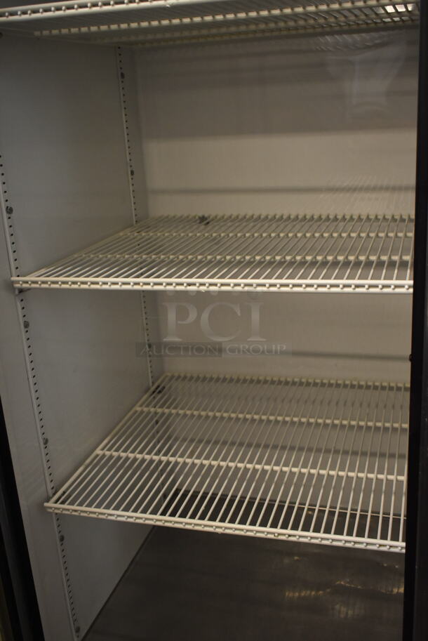 True T-72G Stainless Steel Commercial 3 Door Reach In Cooler Merchandiser w/ Poly Coated Racks on Commercial Casters. 115 Volts, 1 Phase. Tested and Working! - Image 2 of 6