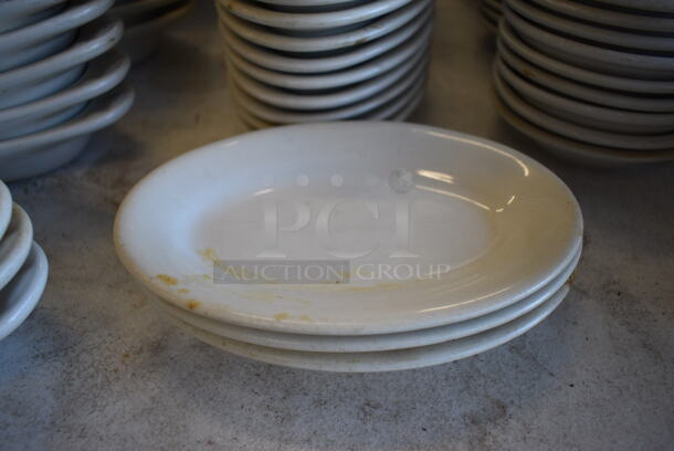 28 White Ceramic Oval Plates. 7x5x1. 28 Times Your Bid!