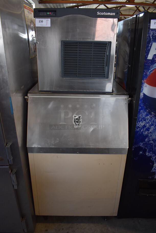 Scotsman N0622A-1B Stainless Steel Commercial Ice Machine Head on Scotsman BH550E Metal Commercial Ice Bin. 115 Volts, 1 Phase. 32x32x74