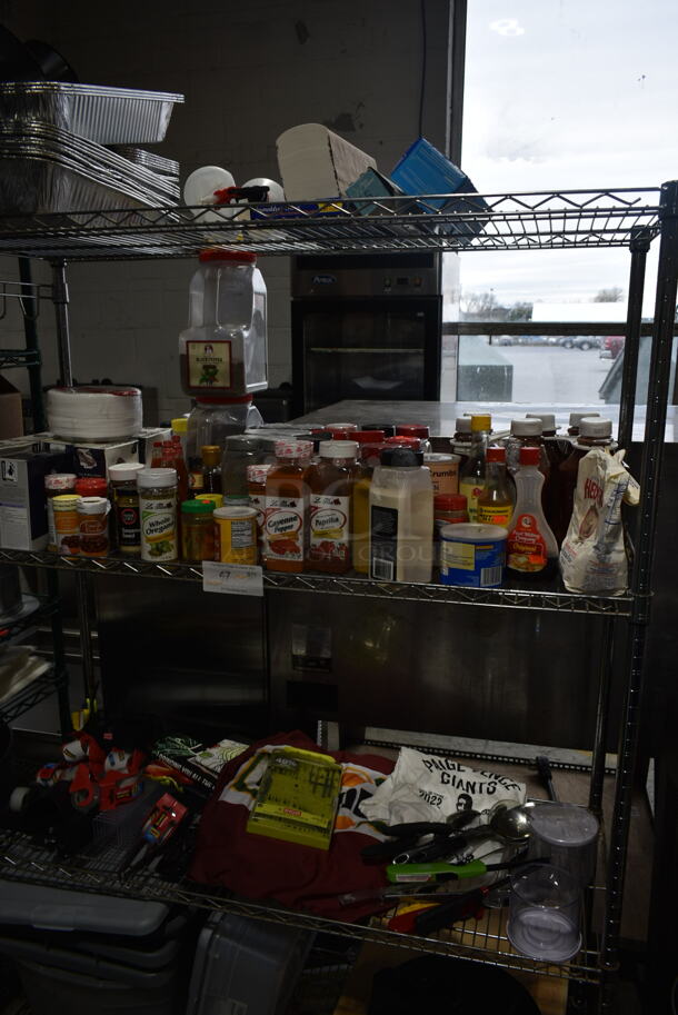 ALL ONE MONEY! Metro Lot of Various Items Including Aluminum Pans, Seasonings, Tape, ion Vacuum and Utensils. Does Not Include Shelving Unit. 