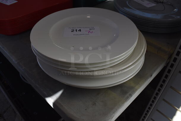 7 Various White Ceramic Plates. Includes 11.5x11.5x1. 7 Times Your Bid!