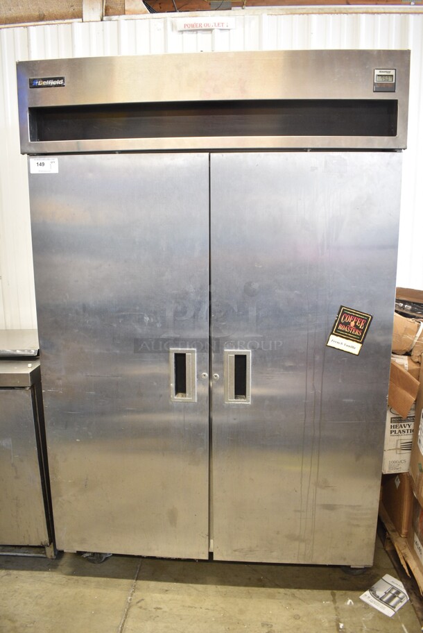Delfield Stainless Steel Commercial 2 Door Reach In Cooler w/ Poly Coated Racks on Commercial Casters. Cannot Test - Unit Trips Breaker - Image 1 of 9