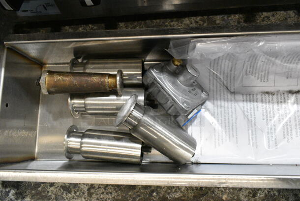 BRAND NEW SCRATCH AND DENT! 2024 Garland GTGG24-GT24M 24" Natural Gas Countertop Griddle with Thermostatic Controls.  - Image 6 of 10