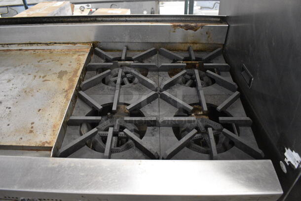 	Blodgett Stainless Steel Commercial Natural Gas Powered Flat Top Griddle w/ 4 Burner Range, Gas Hose and Under Shelf on Commercial Casters. One Caster Needs To Be Reattached. 60x31x43 - Image 4 of 7