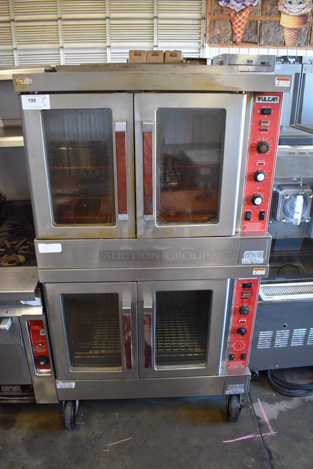 2 Vulcan Stainless Steel Commercial Natural Gas Powered Full Size Convection Oven w/ View Through Doors, Metal Oven Racks and Thermostatic Controls on Commercial Casters. 40x40x72. 2 Times Your Bid!