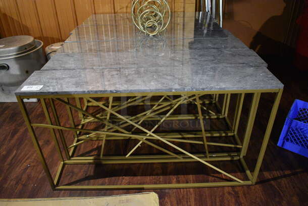 7 Gold Finish Metal Tables w/ Stone Pattern Tabletop. 4 Have Extra Decorative Item. 52x10x29, 12x4x12. 7 Times Your Bid! (lounge)