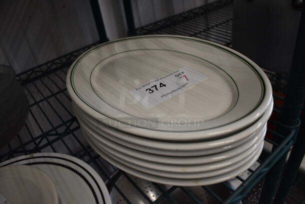 7 White Ceramic Oval Plates w/ Green Lines on Rim. 12.5x9x1. 7 Times Your Bid! - Image 2 of 3