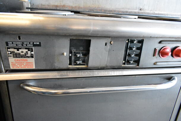 Vulcan E60 Stainless Steel Commercial Electric Powered 10 Burner Hot Plate Range w/ 2 Ovens, Over Shelf and Back Splash. 240 Volts, 1 Phase.  - Image 7 of 8