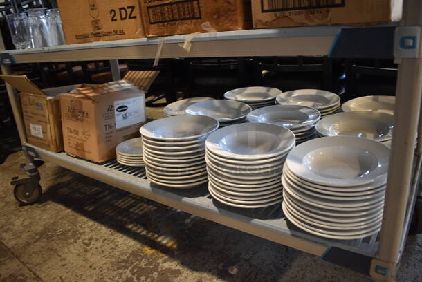 ALL ONE MONEY! Tier Lot of Various Ceramic Dishes Including 125 Pasta Plates and Various Bowls. Includes 9x9x1.5