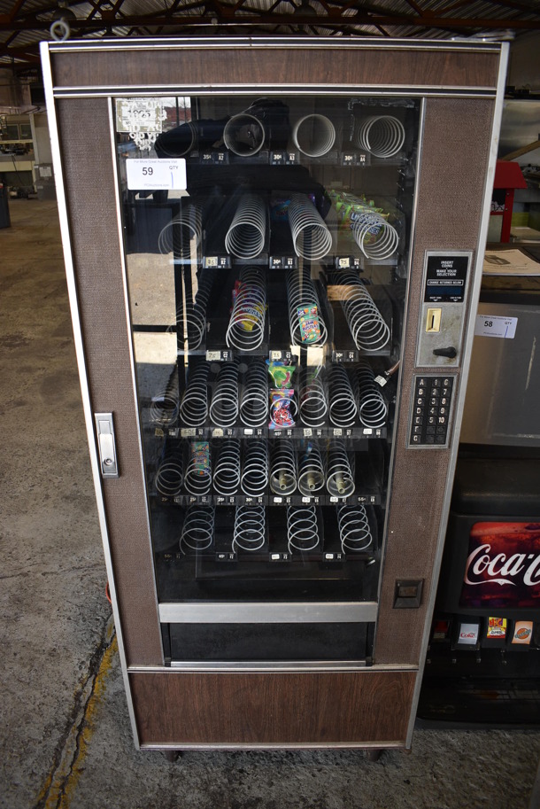 National Vendors Metal Commercial Vending Machine. 115 Volts, 1 Phase. 30x35.5x72. Tested and Does Not Power On