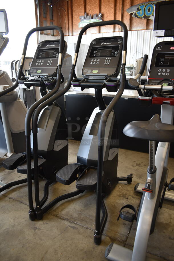 Stair Master Commercial Floor Style Stationary Exercise Stepping Machine w/ Monitor and Heart Rate Handle Grip Monitors and Cup Holders. Tested and Working! - Image 1 of 5