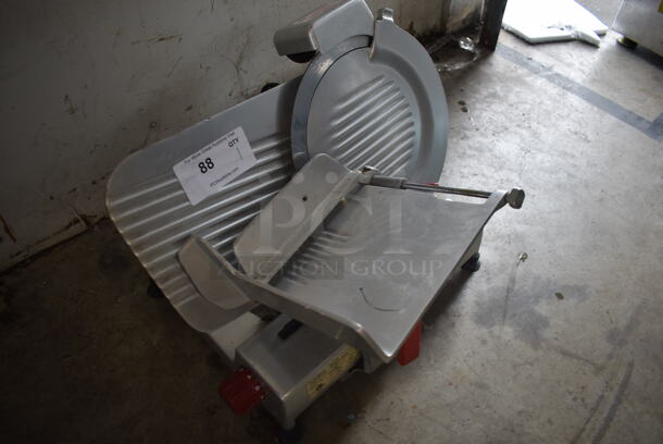 Fleetwood 12 Commercial Stainless Steel Electric Countertop Meat/Cheese Slicer On Rubber Stoppers. 115V, 1 Phase. Tested and Working! - Image 2 of 4