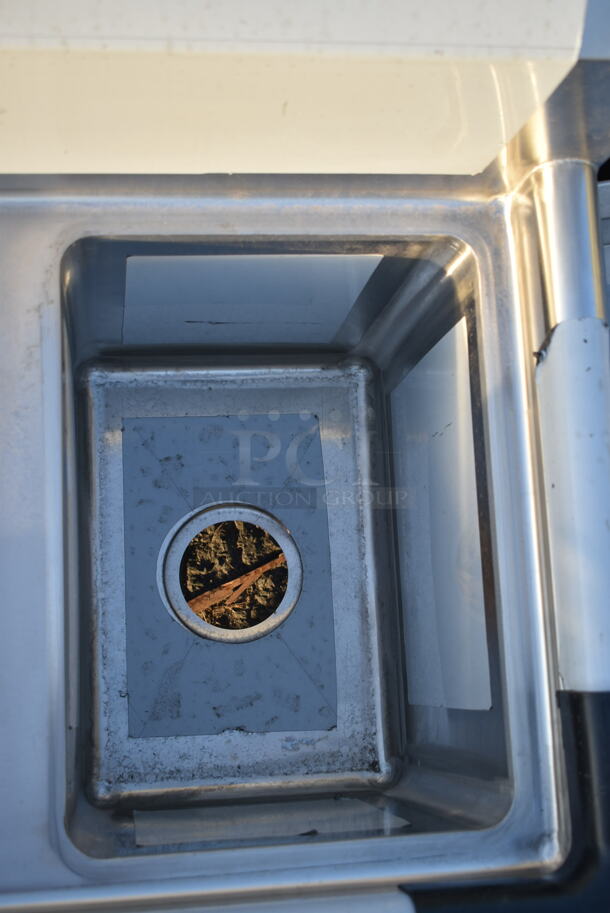 BRAND NEW SCRATCH AND DENT! Regency 600S31014 39" 16-Gauge Stainless Steel Three Compartment Commercial Sink with Galvanized Steel Legs and without Drainboards - 10" x 14" x 12" Bowls. Missing 1 Leg.  - Image 5 of 9