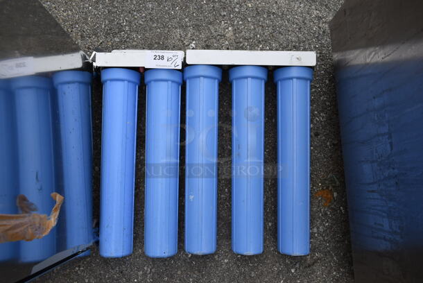 2 Water Filtration Systems; 1 w/ 2 Canisters and 1 w/ 3 Canisters. 2 Times Your Bid!