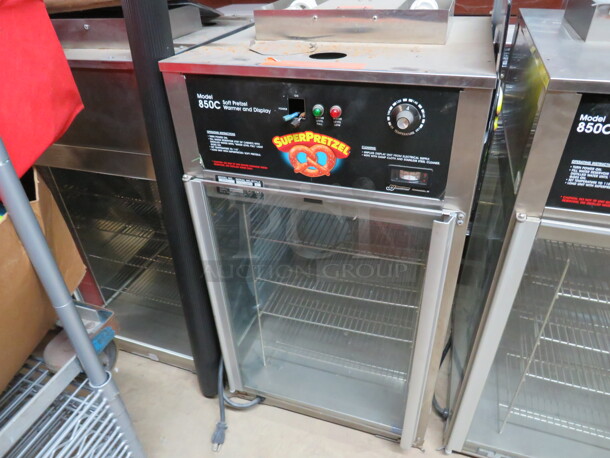 One Hatco Soft Pretzel Display Warmer With 4 Racks. Model# 850C. 1440 Watt. 120 Volt. 18.5X18.5X32.  - Image 1 of 3
