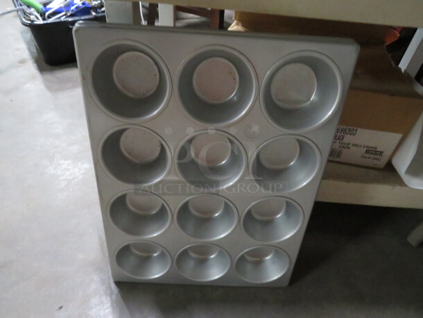 One 20 Hole Commercial Muffin Pan.