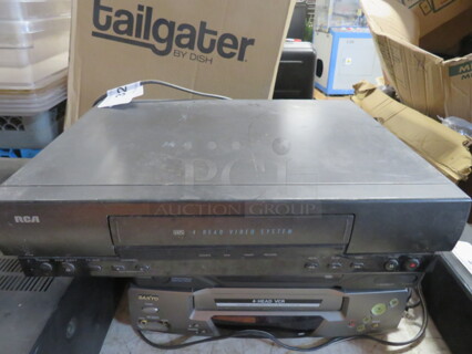 One RCA VHS Player.