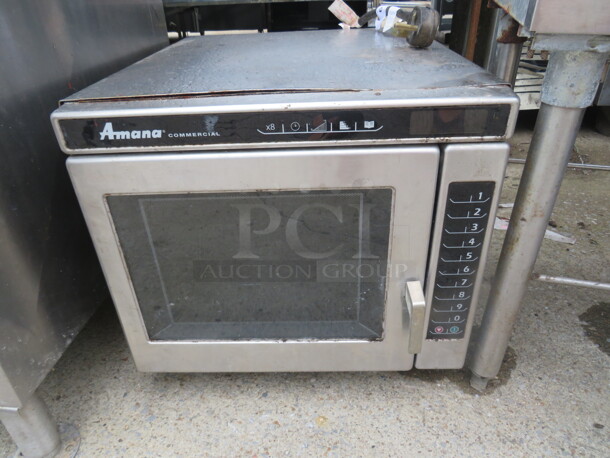 One Amana Microwave. 20X24X18 - Image 2 of 3