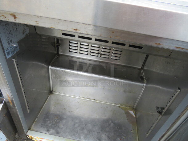 One SS Avantco 1 Door Refrigerated Prep Table On Casters. Model# 178SCL1. 27.5X30X38. Working Not Cold. - Image 2 of 2