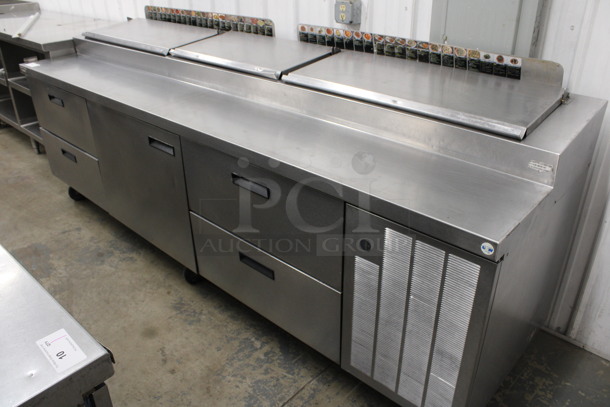 Delfield Stainless Steel Commercial Pizza Prep Table w/ Door and 4 Drawers on Commercial Casters. 114x32x47. Tested and Working!
