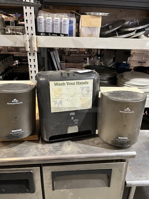 1-Tork Paper Towel Holders (no keys)
2-Georgia Pacific - Image 1 of 1