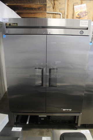 2013 True T-49F ENERGY STAR Stainless Steel Commercial 2 Door Reach In Freezer w/ Poly Coated Racks on Commercial Casters. 115 Volts, 1 Phase. Tested and Working!