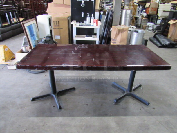 One Wooden Table With A Heavy Laquered Top, And Dual Pedestal Base. 72X32X41