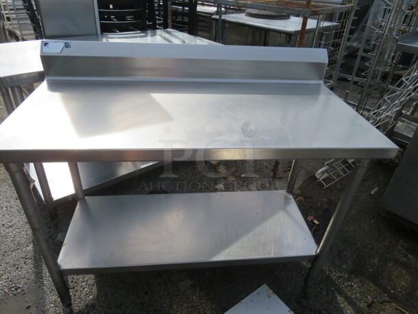 One Stainless Steel Table With Stainless Steel Under Shelf And Backsplash. 48X24X40 - Image 1 of 1