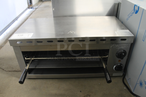 BRAND NEW SCRATCH AND DENT! 2023 Avantco 177CHSME24A Stainless Steel Commercial Electric Powered Cheese Melter. 120 Volts, 1 Phase. Tested and Working!