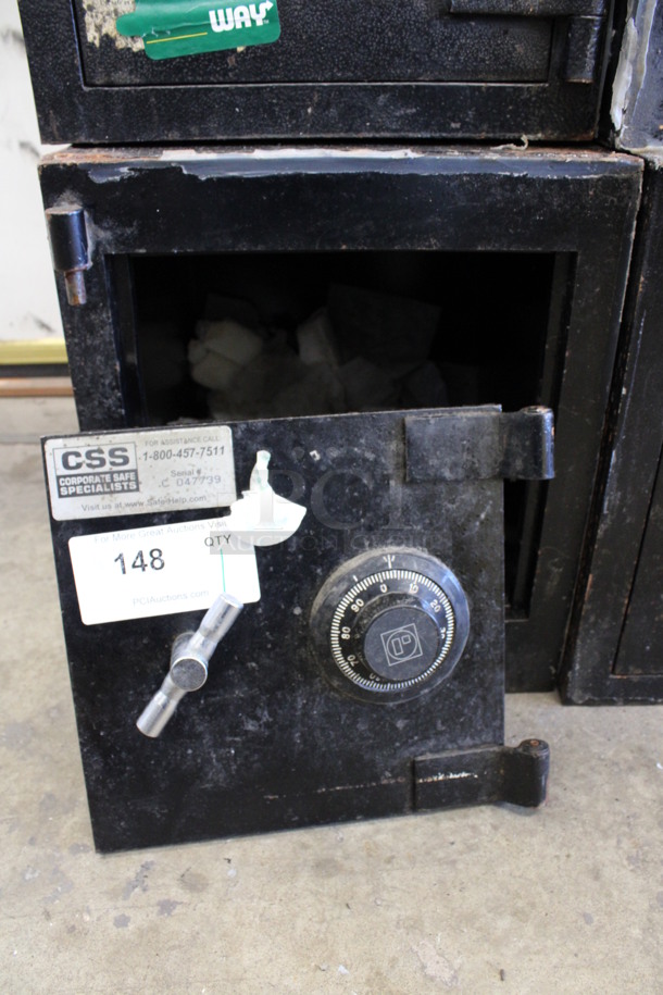 Corporate Safe Specialists Black Metal Single Compartment Safe. Door Needs To Be Reattached. Does Not Come w/ Combination. 13x18x15