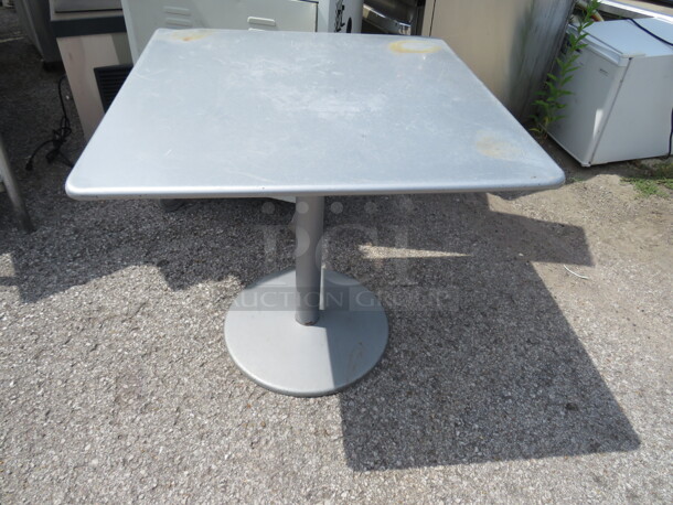 One Metal Patio Table.  - Image 1 of 1