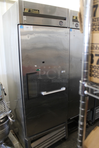 2013 True T-23F ENERGY STAR Stainless Steel Commercial Single Door Reach In Freezer w/ Poly Coated Racks on Commercial Casters. 115 Volts, 1 Phase. Tested and Powers On But Does Not Get Cold