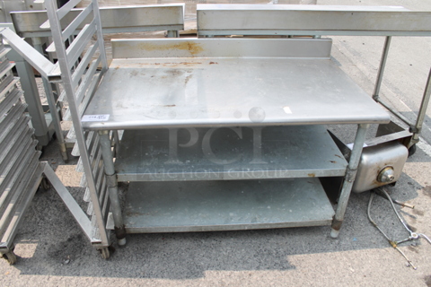 Stainless Steel Commercial Table w/ Back Splash and 2 Under Shelves.