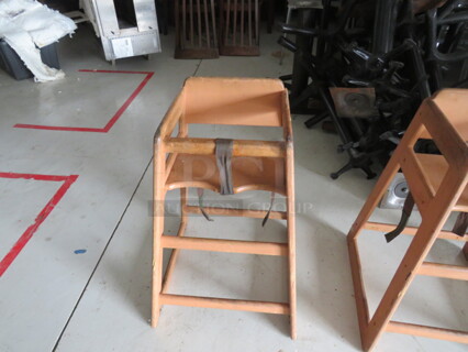 One Wooden High Chair.