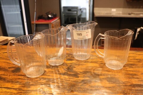 Clear Plastic Pitchers 
Qty 4
Your Bid x 4