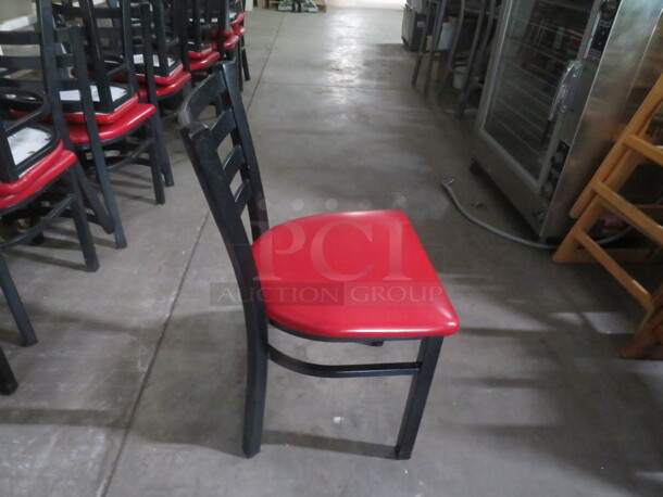 Black Metal Chair With A Red Cushioned Seat. 4XBID - Image 2 of 2