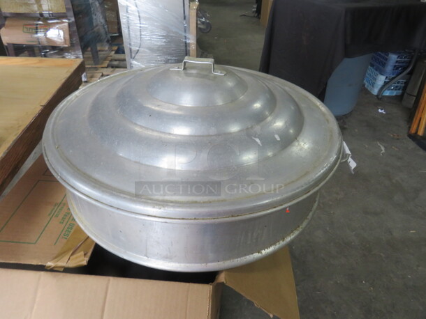 One Aluminum Steamer Pot With Lid.