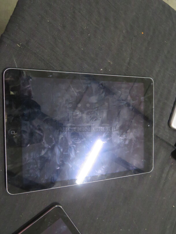 One Apple IPAD. NO CORD. #A1474. NOT TESTED.
