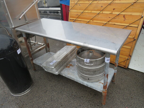 One Stainless Steel Table With Under Shelf. 60X24X33.5