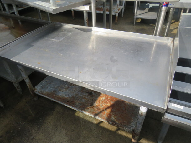 One Stainless Steel Equipment Table With Under Shelf. 48X28X24