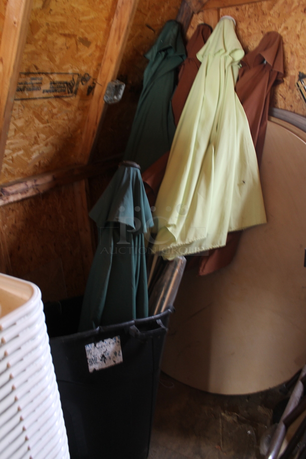 5 Patio Umbrellas in Black Poly Trash Can. 5 Times Your Bid!  (outside shed) - Image 1 of 5