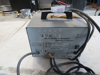 One 24 Volt Charger. 