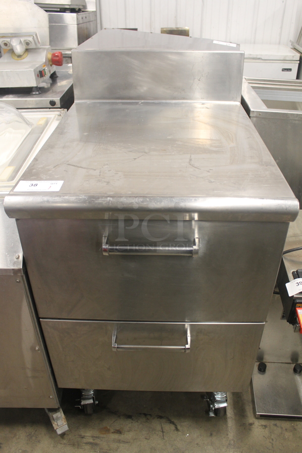 Stainless Steel Commercial Counter w/ 2 Drawers and Back Splash on Commercial Casters.  - Image 1 of 6
