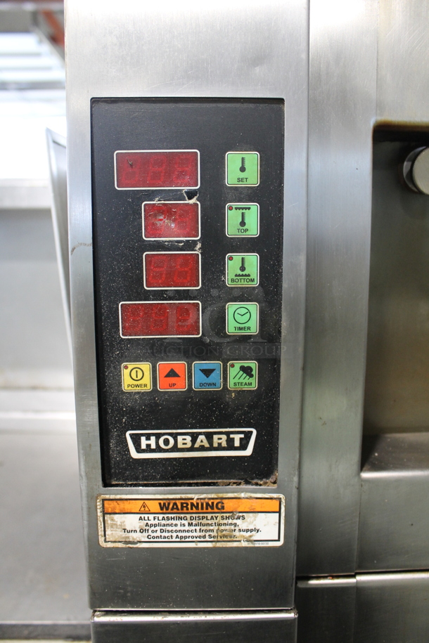 Hobart HWD03D Stainless Steel Commercial Electric Powered Triple Deck Bakery Oven on Pan Rack w/ Commercial Casters. 208 Volts, 3 Phase.  - Image 7 of 11