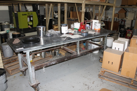 Metal Table w/ Contents on Commercial Casters.