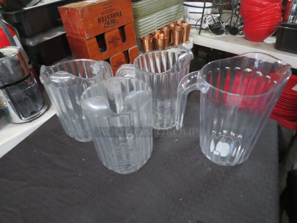 Assorted Clear Poly Water/Tea Pitchers. 4XBID